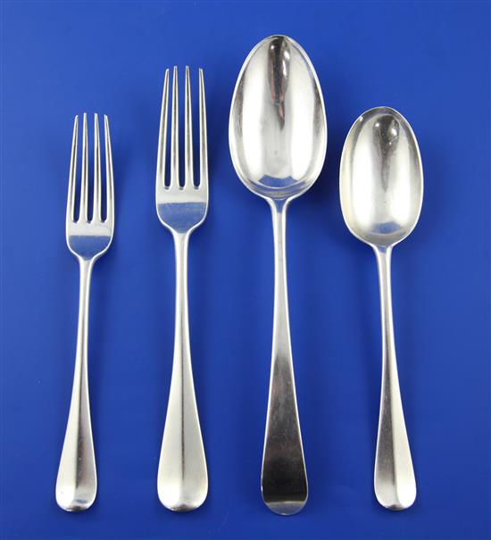 A part canteen of Edwardian silver Hanovarian pattern flatware, 101.5 oz.